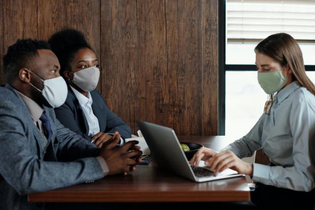 business-people-wearing-face-masks-on-a-meeting-4427931